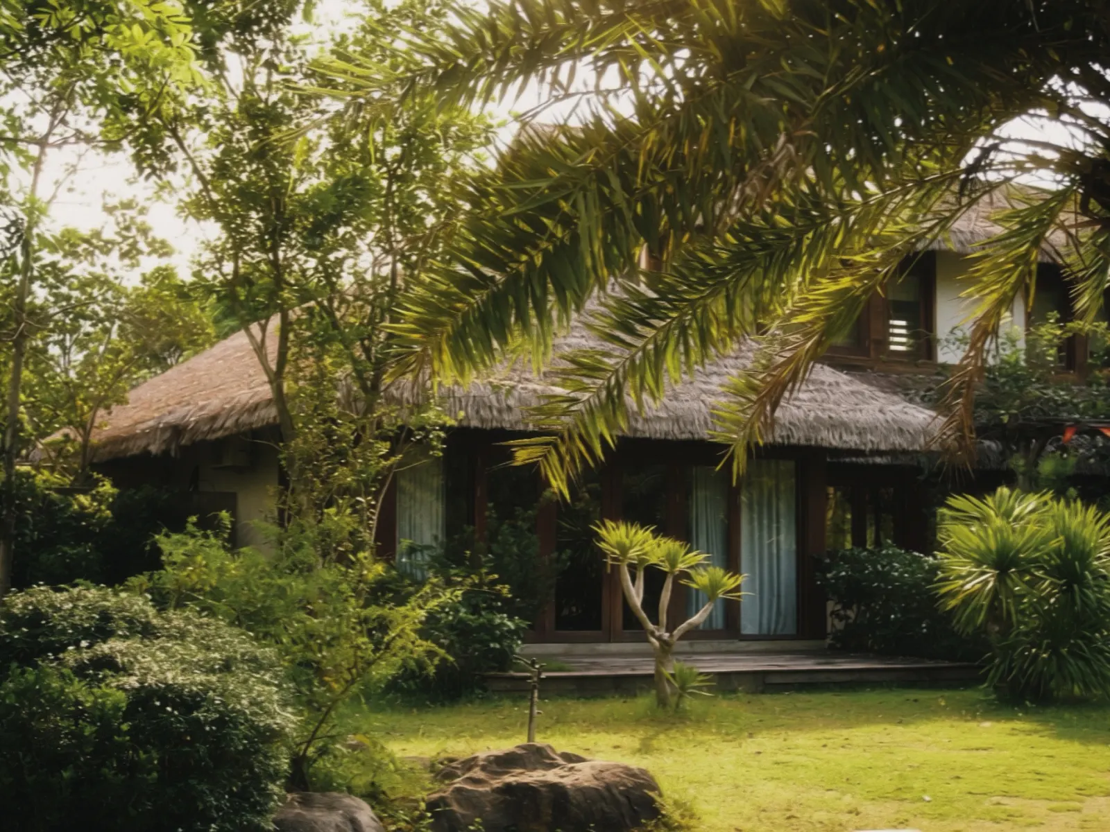 Warm villa interior opening onto garden and forest